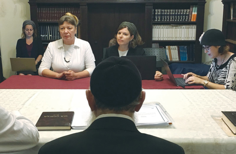  CENTER FOR Women’s Justice convenes a private rabbinic court to annul the marriage of Israel’s longest-standing agunah, Tzvia Gorodetsky (dressed in white), in 2018. (photo credit: Nurit Jacobs Yinon/Aluma Films)