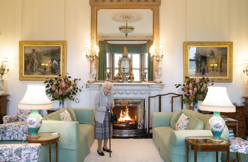  Britain's Queen Elizabeth II waits to meet with new Conservative Party leader and Britain's Prime Minister-elect at Balmoral Castle in Ballater, Scotland, on September 6, 2022.  (credit: JANE BARLOW/POOL/AFP VIA GETTY IMAGES)