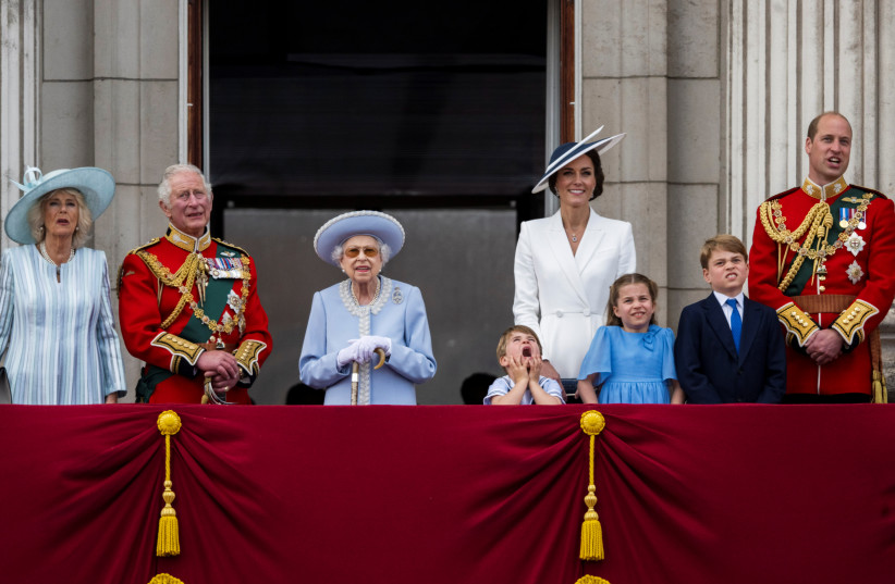 Britain's Queen Elizabeth along with members of the Royal Family watches the special flypast by Britain's RAF (Royal Air Force) from Buckingham Palace balcony following the Trooping the Colour parade, as a part of her platinum jubilee celebrations, in London.