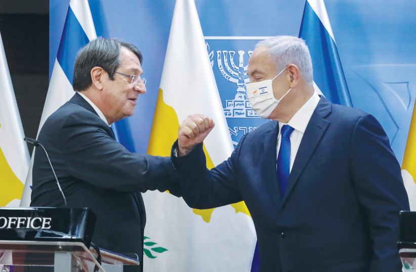  Then-prime minister Benjamin Netanyahu and Cypriot President Nicos Anastasiades hold a news conference in Jerusalem last year. (photo credit: MARC ISRAEL SELLEM/THE JERUSALEM POST)