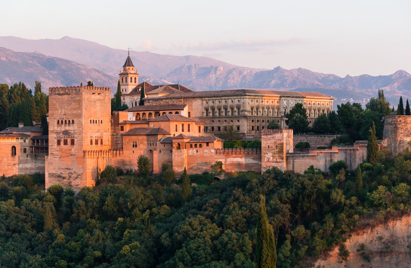 Dawn on Charles V palace in Alhambra, Granada, Spain. (photo credit: Wikimedia Commons)