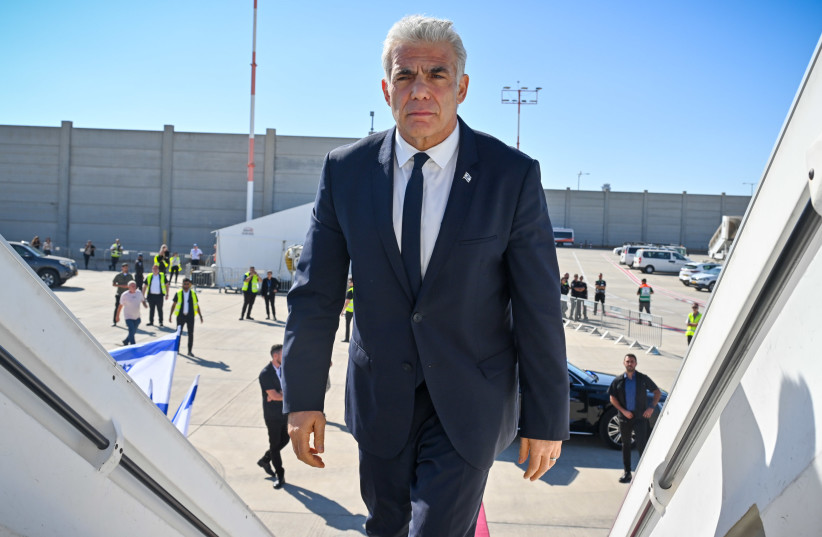  Prime Minister Yair Lapid at the Ben Gurion Airport tarmac before departing to Germany, September 11, 2022.  (credit: KOBI GIDEON/GPO)