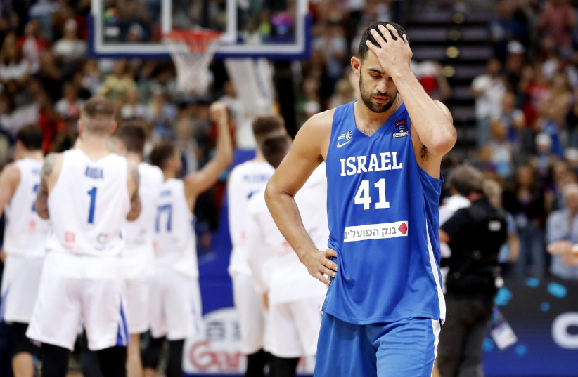  ISRAEL’S TOMER GINAT reacts dejectedly after Israel’s Eurobasket loss to the Czech Republic, which sealed the blue-and-white’s fate of being sent home early. (photo credit: DAVID W CERNY/REUTERS)