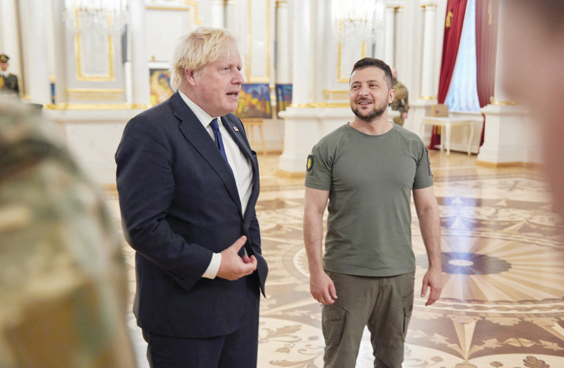  UKRAINE’S PRESIDENT Volodymyr Zelensky and then-British prime minister Boris Johnson meet in Kyiv, last month. (photo credit: UKRAINIAN PRESIDENTIAL PRESS SERVICE/REUTERS)