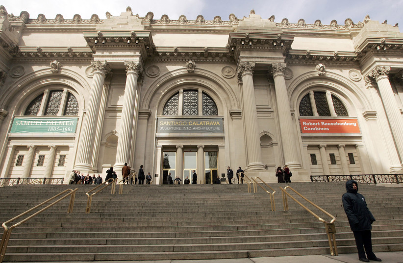 Visitors walk along the steps of the Metropolitan Museum of Art in New York, March 6, 2006. (photo credit: REUTERS/KEITH BEDFORD)