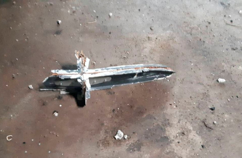  A part of an unmanned aerial vehicle, what Ukrainian military authorities described as an Iranian made suicide drone Shahed-136 and which was shot down near the town of Kupiansk, amid Russia's attack on Ukraine, is seen in Kharkiv region, Ukraine, in this handout picture released September 13, 2022 (credit: THE STRATEGIC COMMUNICATIONS DIRECTORATE OF THE UKRAINIAN ARMED FORCES/HANDOUT VIA REUTERS)