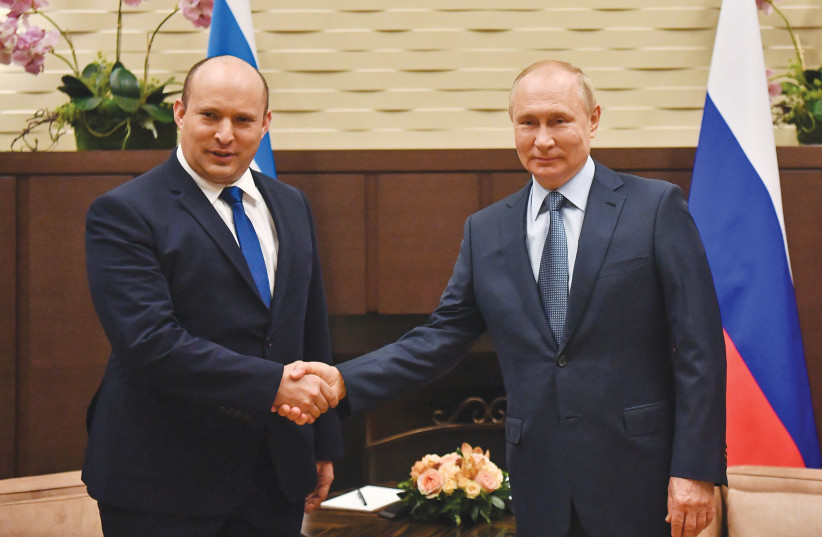  THEN-PRIME MINISTER Naftali Bennett meets Russian President Vladimir Putin in Sochi, last year.  (credit: Sputnik/Kremlin/Reuters)