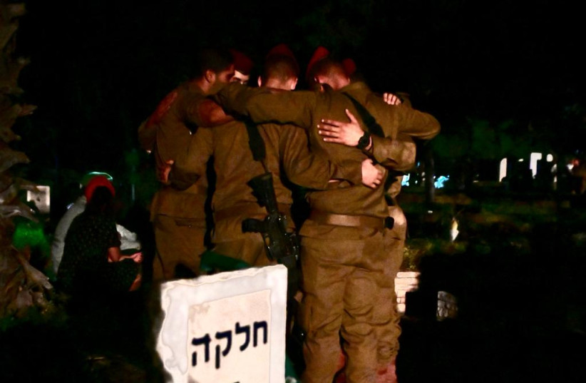  IDF soldiers mourn at the funeral of Maj. Bar Falah, who was killed in clashes with Palestinians with Jenin, on September 14, 2022. (photo credit: AVSHALOM SASSONI/MAARIV)