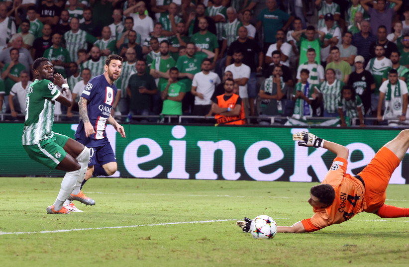  Paris St Germain's Lionel Messi in action with Maccabi Haifa's Josh Cohen (photo credit: REUTERS/NIR ELIAS)