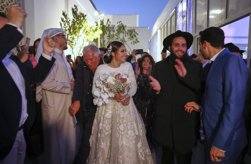 Rabbi Levi Duchman and his bride Lea at their wedding. (credit: CHABAD)