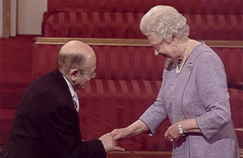  THE WRITER is awarded an MBE at the 2006 Queen’s Birthday Honours at Buckingham Palace. (photo credit: screenshot)