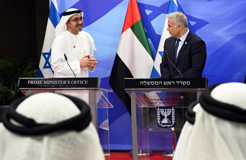   Prime Minister Lapid and UAE Foreign Minister Sheikh Abdullah bin Zayed Al Nahyan, September 15 2022. (credit: HAIM ZACH/GPO)