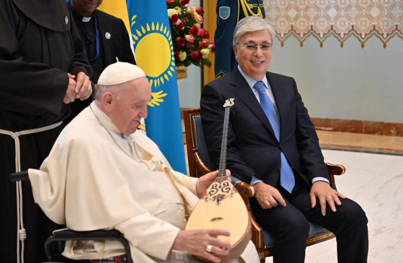 Kazakh President Kassym-Jomart Tokayev presents dombra to Pope Francis in Nur-Sultan, Kazakhstan, September 15, 2022. (credit:  Press Service of the President of Kazakhstan/Handout via REUTERS)
