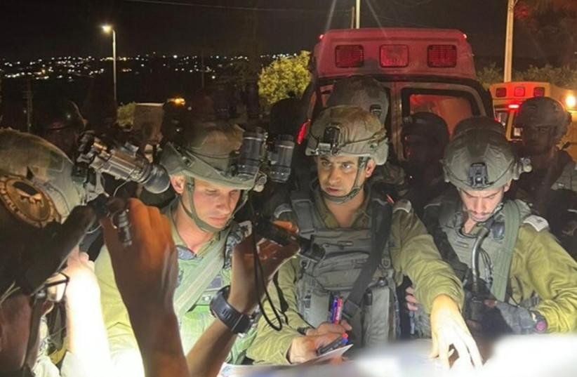  IDF soldiers at the scene of a shooting attack in Carmel in the southern West Bank, September 19, 2022 (photo credit: IDF SPOKESPERSON'S UNIT)