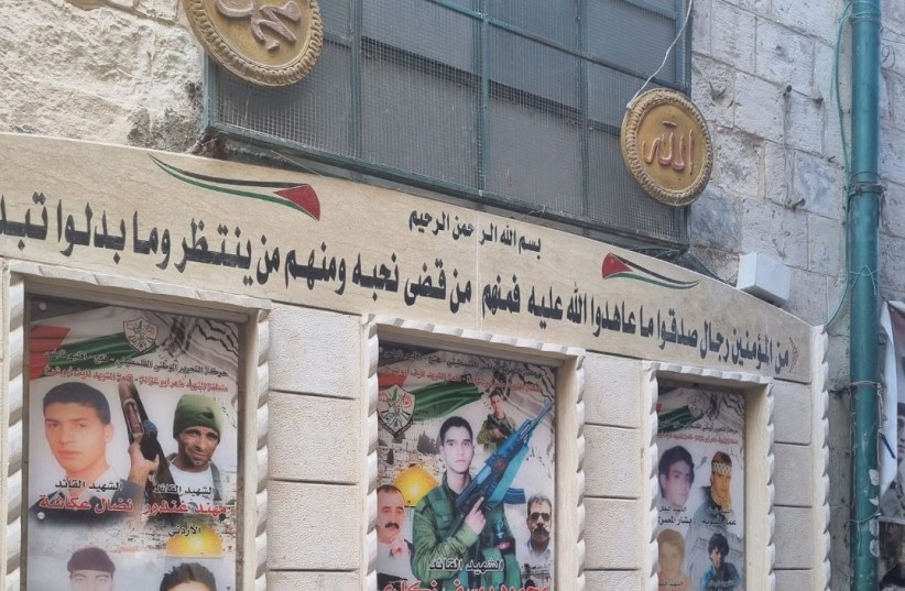  POSTERS SHOWING photos of Palestinian gunmen killed by the IDF are displayed in the Old City of Nablus this week. (photo credit: KHALED ABU TOAMEH)