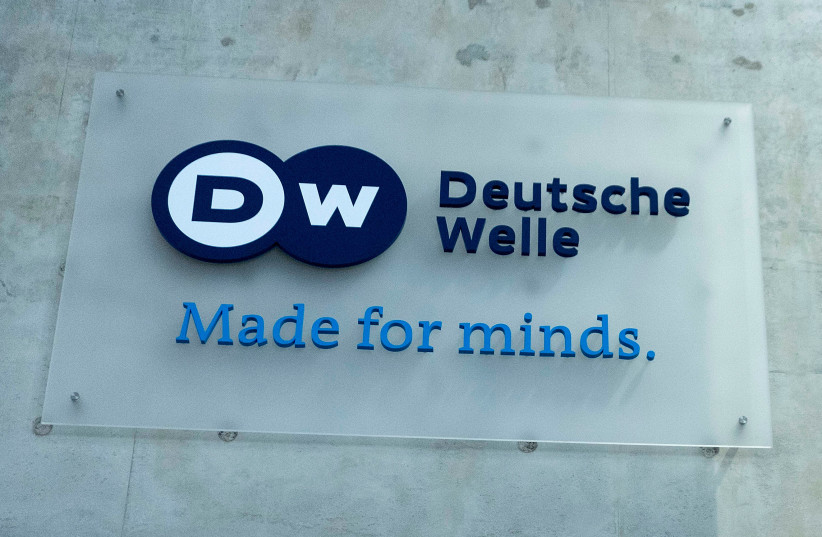 The Deutsche Welle logo is seen on the foyer of the German broadcaster's Berlin location, March 2, 2022. (photo credit: CARSTEN KOALL/PICTURE ALLIANCE VIA GETTY IMAGES)