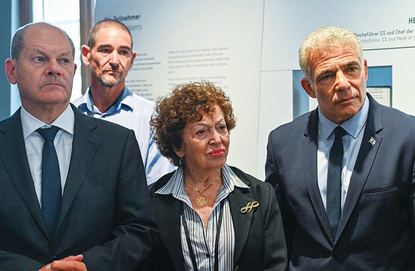  ONE OF the Holocaust survivors who accompanied Prime Minister Yair Lapid on his trip to Germanyl ast week stands between the prime minister and German Chancellor Olaf Scholz on a visit to the Wannsee Villa. (photo credit: KOBI GIDEON/GPO)