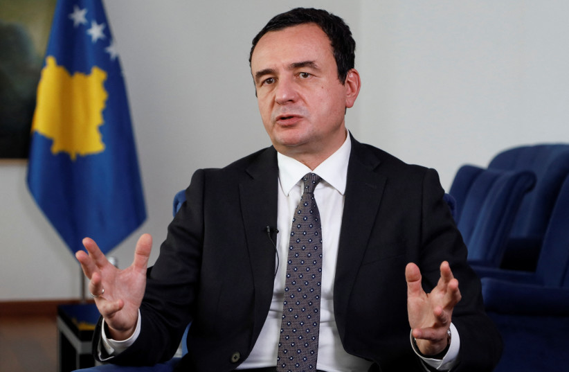 Kosovo's Prime Minister Albin Kurti speaks during an interview with Reuters at his office in Pristina, Kosovo, August 10, 2022. (photo credit: REUTERS/FEDJA GRULOVIC)