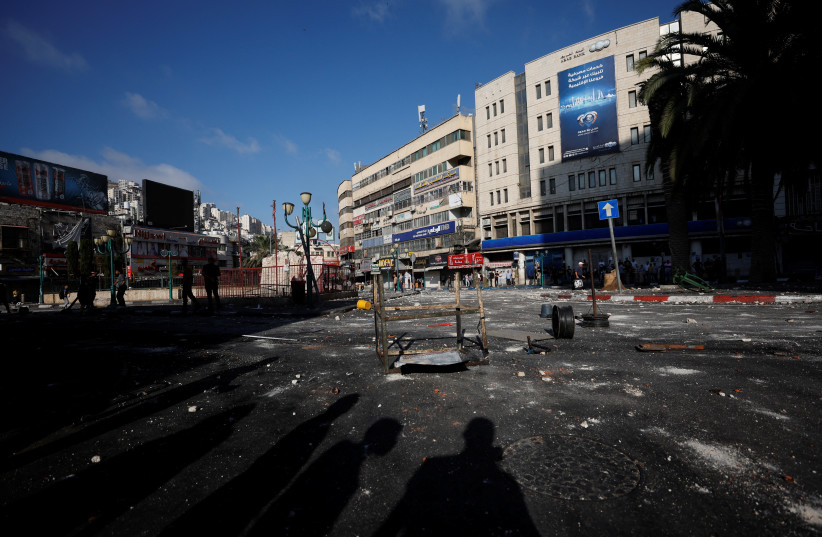  A view of the site where clashes between Palestinian gunmen and Palestinian security force take place in Nablus in the West Bank September 20, 2022.  (credit: REUTERS/MOHAMAD TOROKMAN)