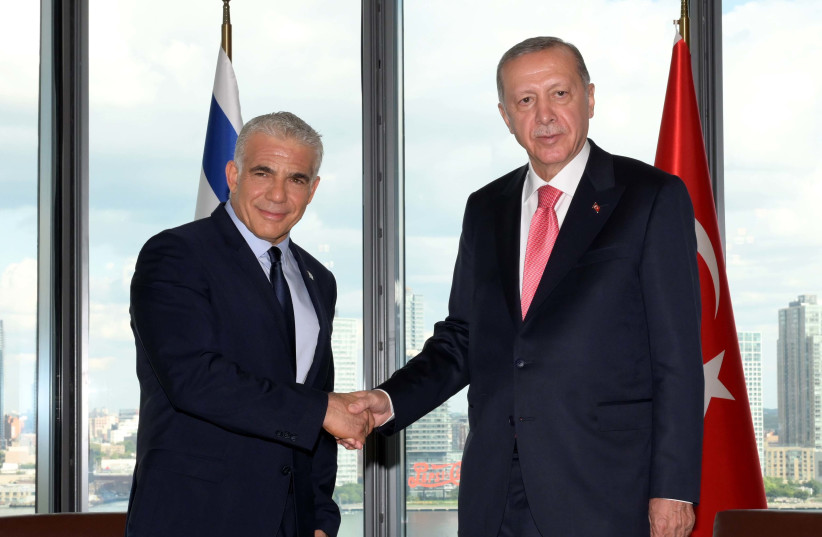Prime Minister Yair Lapid meets with Turkish President Recep Tayyip Erdogan at Beit al-Turki near the UN headquarters in New York. (photo credit: Avi Ohayon/GPO)