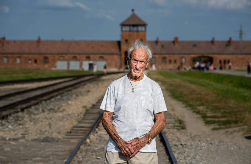  Edward Mosberg in front of Nazi Auschwitz-Birkenau death camp (photo credit: Llion Roberts/From the Depths)