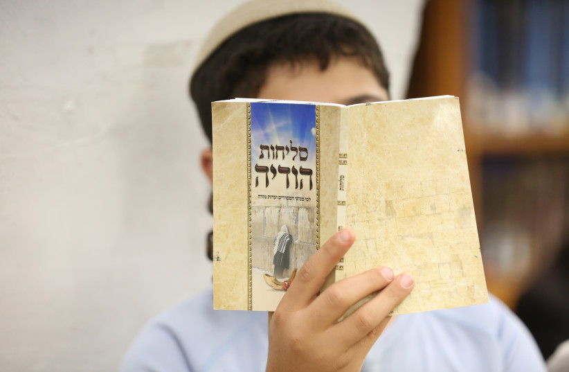  SAYING ‘SELIHOT’ in Meron: The Siddur and Mahzor are filled with numerous references to God’s attentiveness. (photo credit: FLASH90)