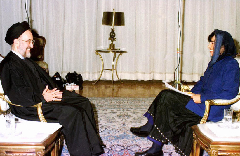  Then Iranian President Mohammad Khatami (L) with Iranian-born CNN correspondent Christianne Amanpour (R) prior to their interview in Tehran. The interview was the first of its kind by an Iranian leader since ties were broken between the US and Iran following the 1979 Islamic revolution.  (credit: IRNA/AFP VIA GETTY IMAGES)