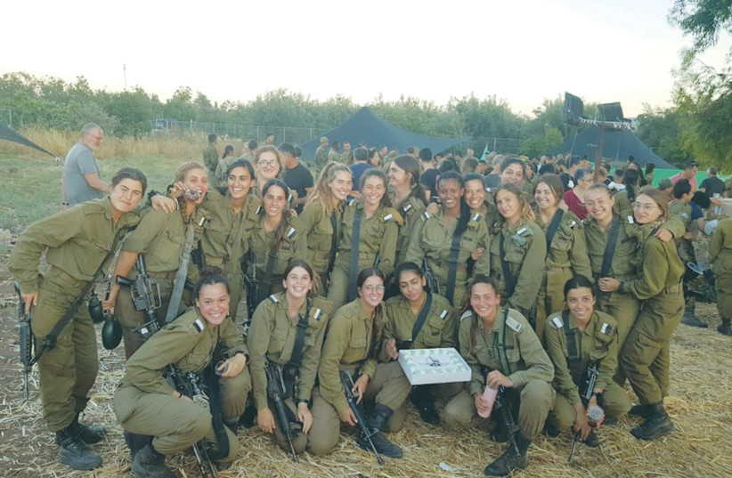 THE WRITER and her comrades serve as a team and celebrate as a team. (photo credit: IDF)
