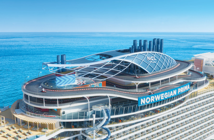  THE ‘NORWEGIAN PRIMA’ – at 18 stories it is a huge ocean liner, at full capacity able to carry some 3,100 guests and a staff of 1,600. (photo credit: NCL)