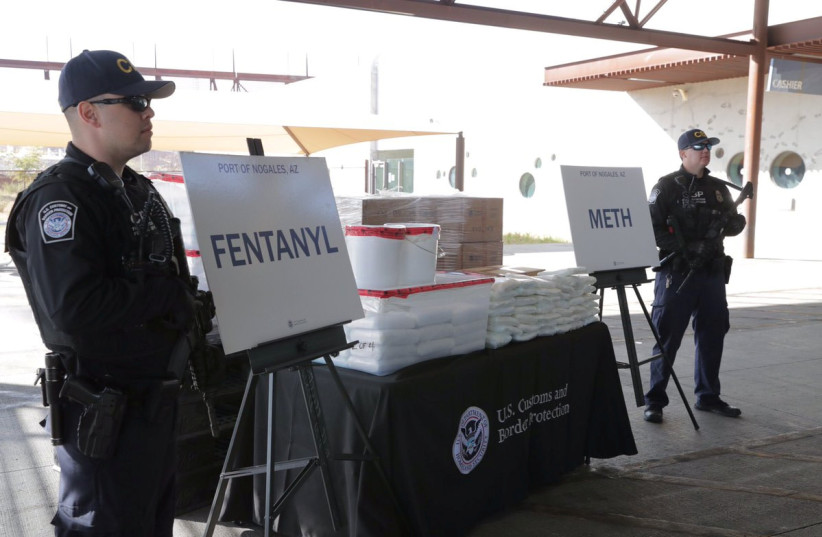 Packets of fentanyl mostly in powder form and methamphetamine, which US Customs and Border Protection say they seized from a truck crossing into Arizona from Mexico, is on display during a news conference at the Port of Nogales, Arizona, US, January 31, 2019. (photo credit: COURTESY US CUSTOMS AND BORDER PROTECTION/HANDOUT VIA REUTERS)