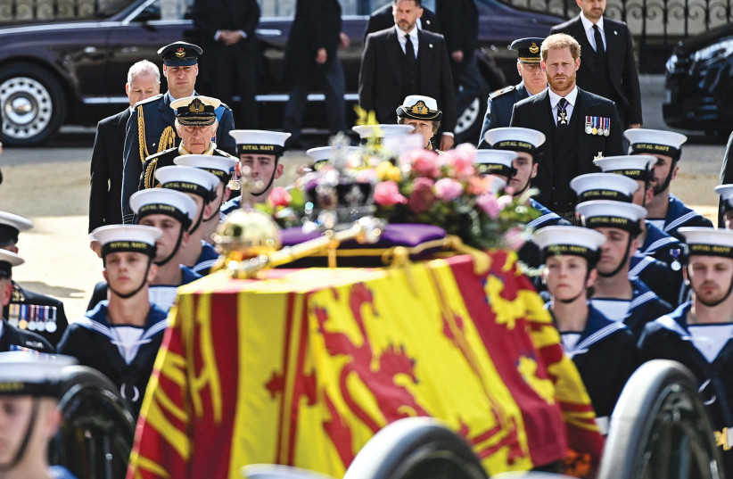  AT THE funeral last week of Her Majesty Queen Elizabeth II, the coffin is transported along The Mall toward Buckingham Palace. (photo credit: MARC ASPLAND/REUTERS)