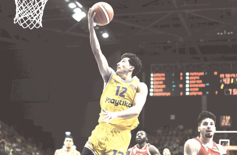 John DiBartolomeo and Maccabi Tel Aviv faced a feisty Hapoel Gilboa/Galil in the Winner League quarterfinals, and needed a fourth-quarter rally to capture a 85-75 victory and set up a final four date with Hapoel Holon. (credit: WINNER LEAGUE/COURTESY)