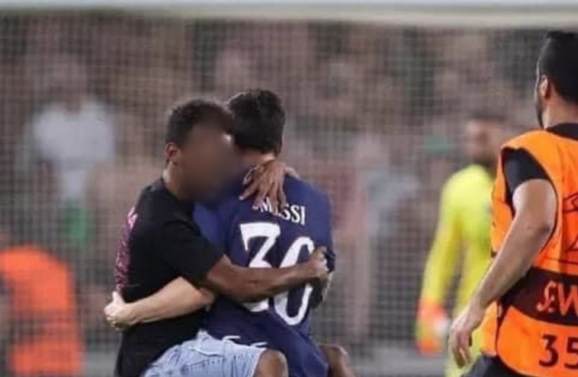  Photo of the person who burst onto the soccer field to hug soccer player Lionel Messi September 14, 2022. (photo credit: POLICE SPOKESPERSON'S UNIT)
