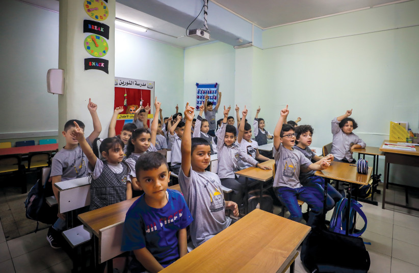  PUPILS PARTICIPATE at the Noreen school in the Beit Hanina neighborhood, Sept. 1. (photo credit: JAMAL AWAD/FLASH90)