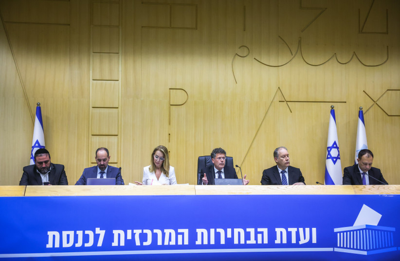  Director of the Elections Committee of the Knesset, Orly Adas, Yitzhak Amit, Chairman of the Election Committee and Attorney Ilan Bombach, Vice Chairman of the Election Committee discuss the disqualification of Balad and Ra'am on September 22, 2022 at the Knesset in Jerusalem.  (photo credit: YONATAN SINDEL/FLASH90)