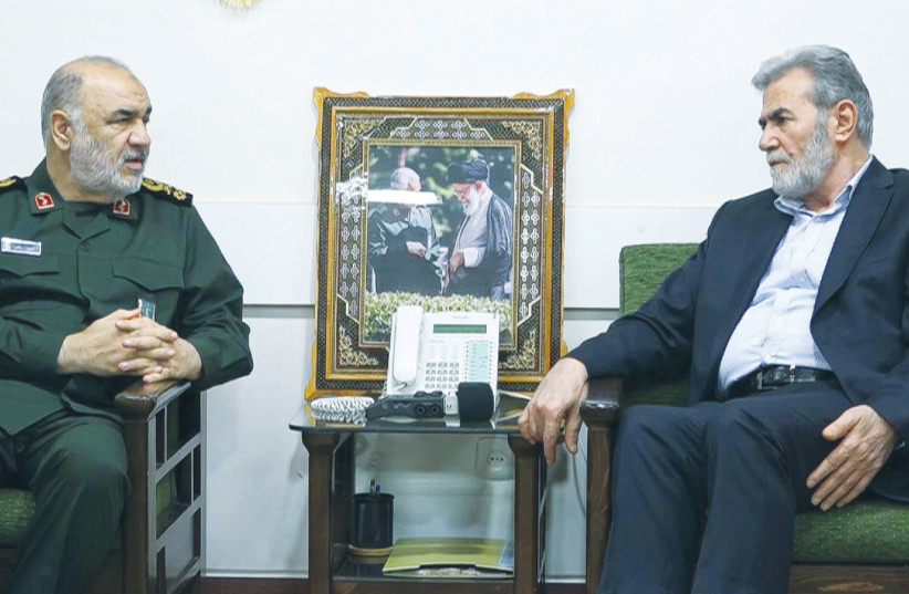  IRGC COMMANDER-in-Chief Maj.-Gen. Hossein Salami (left) meets with Ziyad Nakhaleh, secretary-general of Palestinian Islamic Jihad, in Tehran last month. (photo credit: IRGC/West Asia News Agency/Reuters)