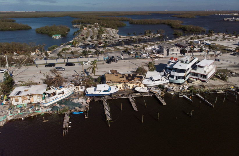 A destroyed marina is seen after Hurricane Ian caused widespread destruction in Fort Myers Beach, Florida, US, September 29, 2022. (photo credit: REUTERS/MARCO BELLO)