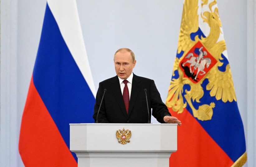 Russian President Vladimir Putin delivers a speech during a ceremony to declare the annexation of the Russian-controlled territories of four Ukraine's Donetsk, Luhansk, Kherson and Zaporizhzhia regions, after holding what Russian authorities called referendums in the occupied areas of Ukraine that w (photo credit: REUTERS)