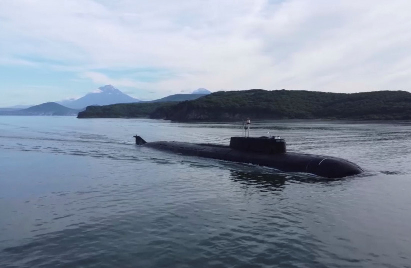  A still image from video, released by the Russian Defence Ministry, shows what it said to be a Russian nuclear-powered submarine sailing during the military drills Umka-2022 in the Chukchi Sea, in this still image taken from handout footage released September 16, 2022. (credit: RUSSIAN DEFENSE MINISTRY/HANDOUT VIA REUTERS)