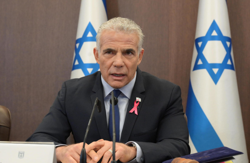  Prime Minister Yair Lapid at a cabinet meeting on 10/02/2022. (photo credit: AMOS BEN GERSHOM/GPO)