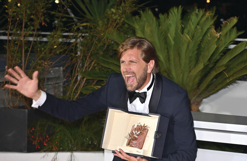  RUBEN OSTLUND winning the Palme d’Or at Cannes. (credit: Paul Smith)