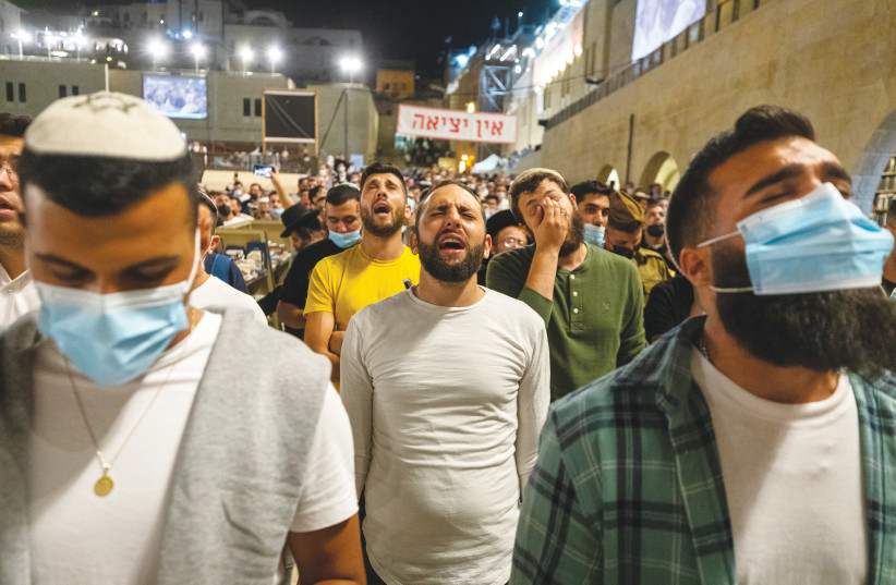  PRAYERS AT the Kotel.  (credit: OLIVIER FITOUSSI/FLASH90)
