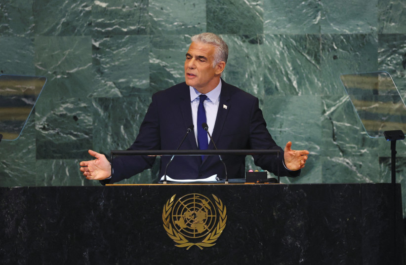  PRIME MINISTER Yair Lapid addresses the 77th Session of the UN General Assembly in New York City, Sept. 22.  (credit: Mike Segar/Reuters)