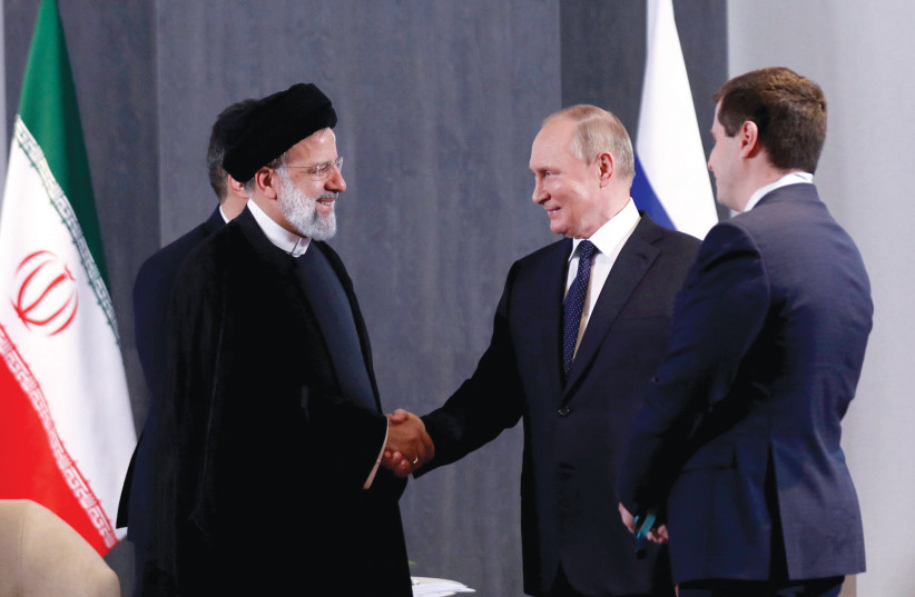  RUSSIAN PRESIDENT Vladimir Putin meets with Iranian President Ebrahim Raisi at a summit in Samarkand, Uzbekistan, last month. (photo credit: Iranian Presidential Website/WANA/handout via Reuters)