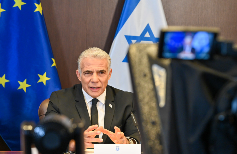  Prime Minister Yair Lapid in a video call with representatives of the European Union. (photo credit: KOBI GIDON / GPO)