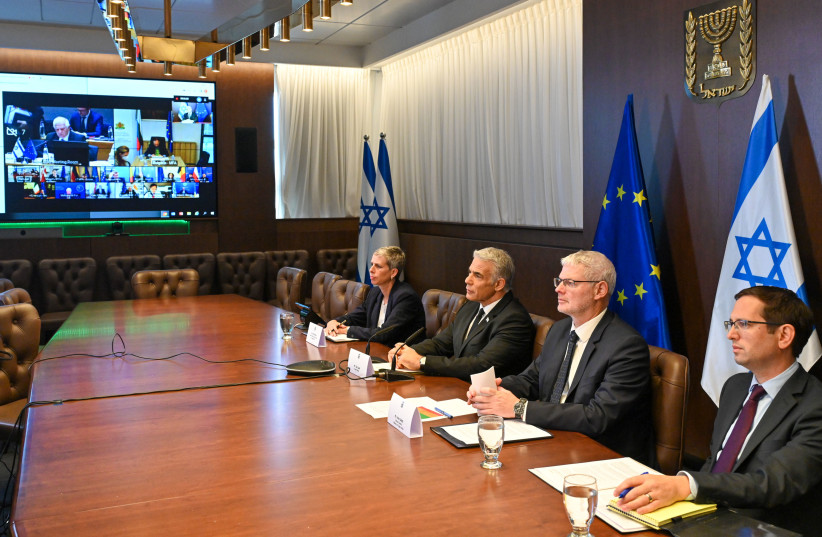 Prime Minister Yair Lapid speaks to representatives of the EU in a video call. (credit: KOBI GIDON / GPO)