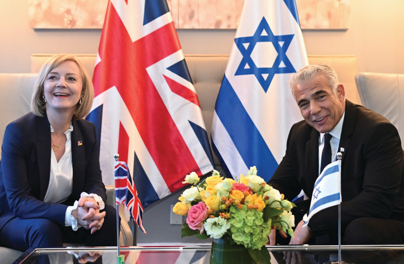 Prime Minister Yair Lapid and UK counterpart Liz Truss meet on the sidelines of the annual opening of the UN General Assembly last month. (photo credit: TOBY MELVILLE/REUTERS)
