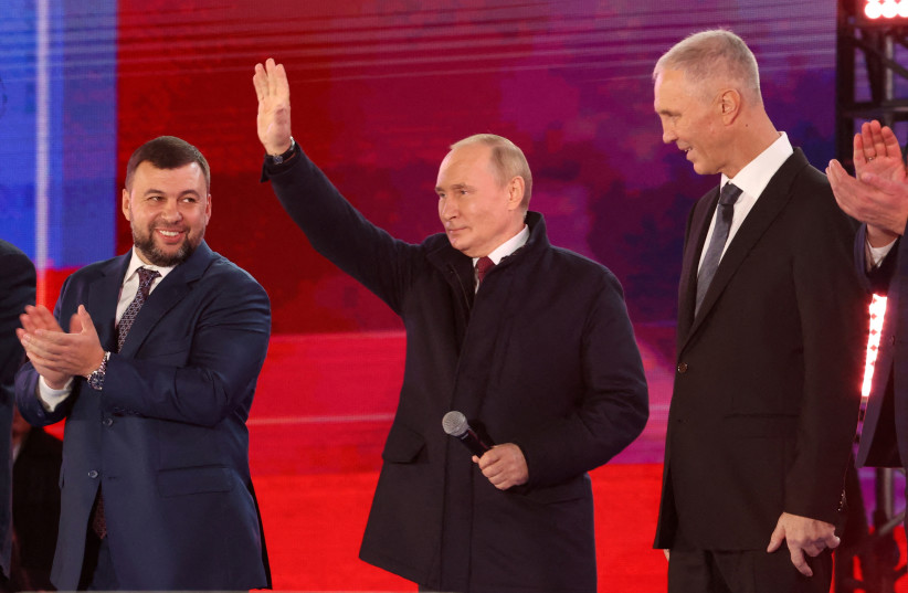 Russian president Vladimir Putin attends concert marking Russia's annexation of four Ukrainian territories held in Moscow, September 30, 2022 (photo credit: Sputnik/Sergei Karpukhin/Pool via REUTERS)