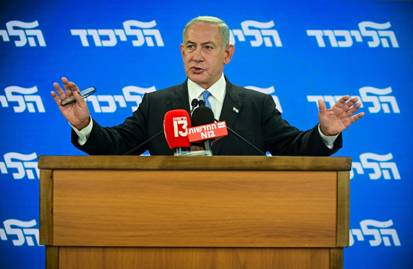  Leader of the Opposition and head of the Likud party Benjamin Netanyahu speaks to the media  in Tel Aviv on October 3, 2022.  (photo credit: AVSHALOM SASSONI/FLASH90)