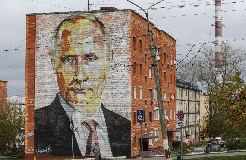  A view shows an apartment block with a mural depicting Russian President Vladimir Putin in the town of Kashira in the Moscow region, Russia October 6, 2022 (photo credit: REUTERS/EVGENIA NOVOZHENINA)